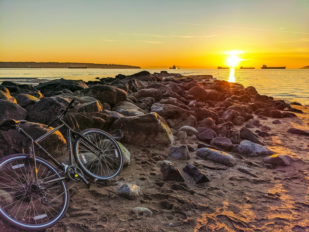 Bicycle beside Vancouver’s seawall at sunset